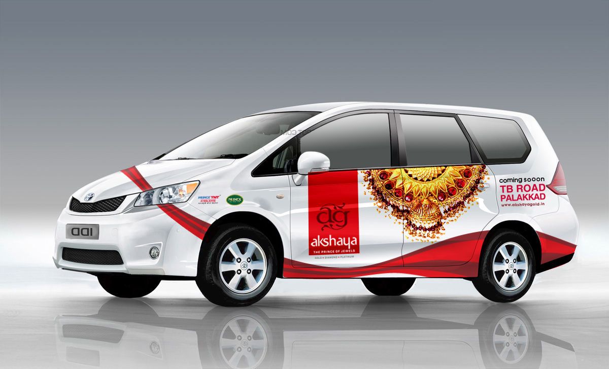 A Toyota Innova vehicle with Akshaya Gold & Diamonds Coming soon campain design