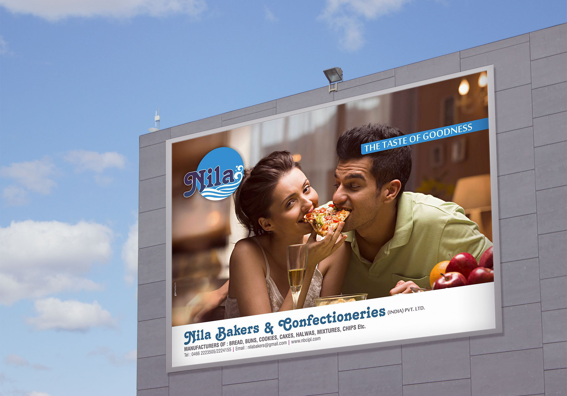 Couple sharing pizza - Nila Bakers and Confectionaries Billboard advertisement design