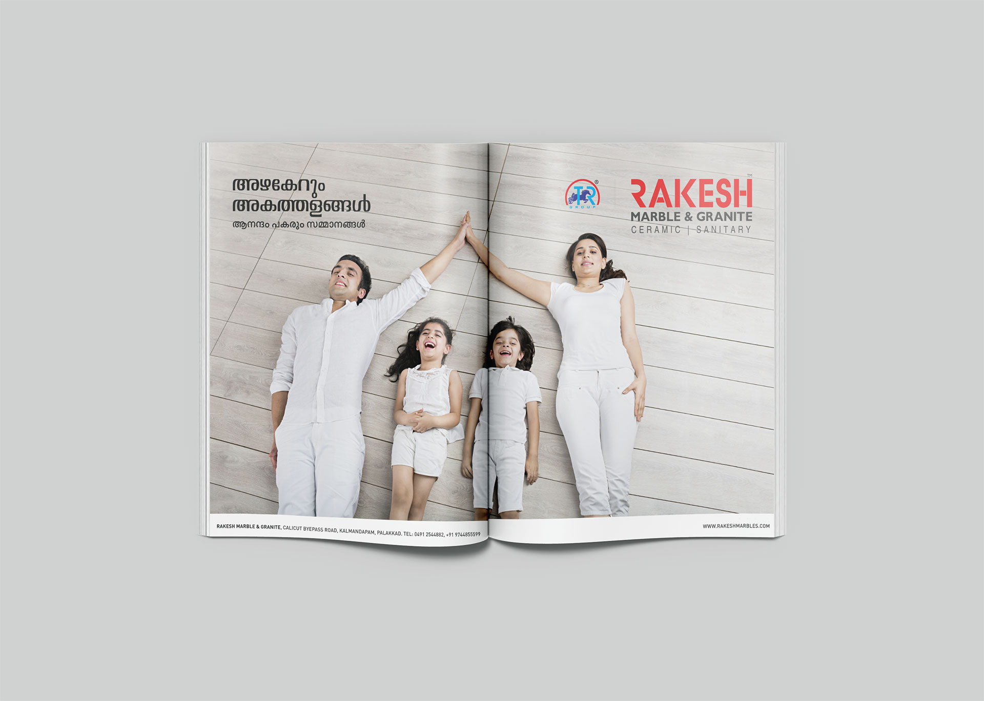 An opend magazine displays Rakesh Marble Advertisment